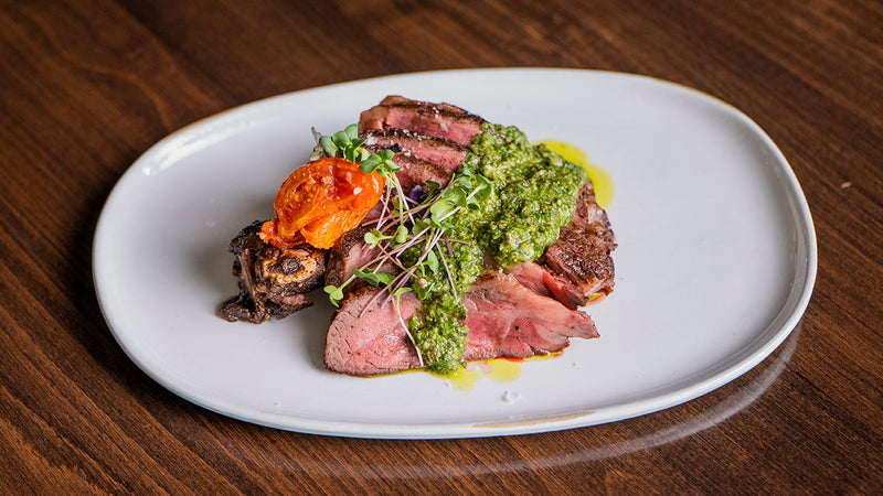 Pan-Seared Dry-Aged Bone-In Ribeye with Cilantro Chimichurri