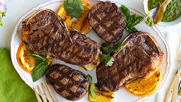 Grilled NY Strip Steak and Filet Mignon with Citrus Caper Herb Sauce